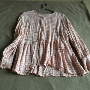 Woman’s gingham peplum top